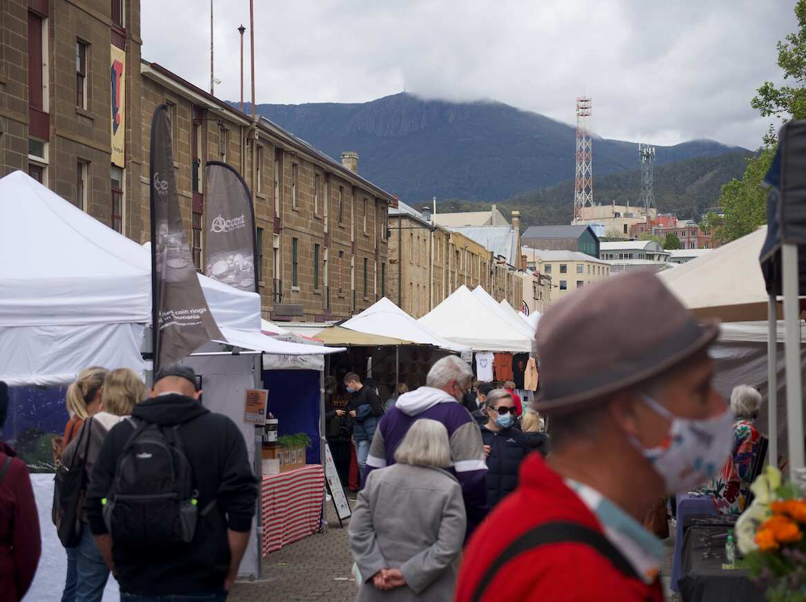 Stallholders at Hobart's Salamanca Markets are hoping the border reopening will help improve business.