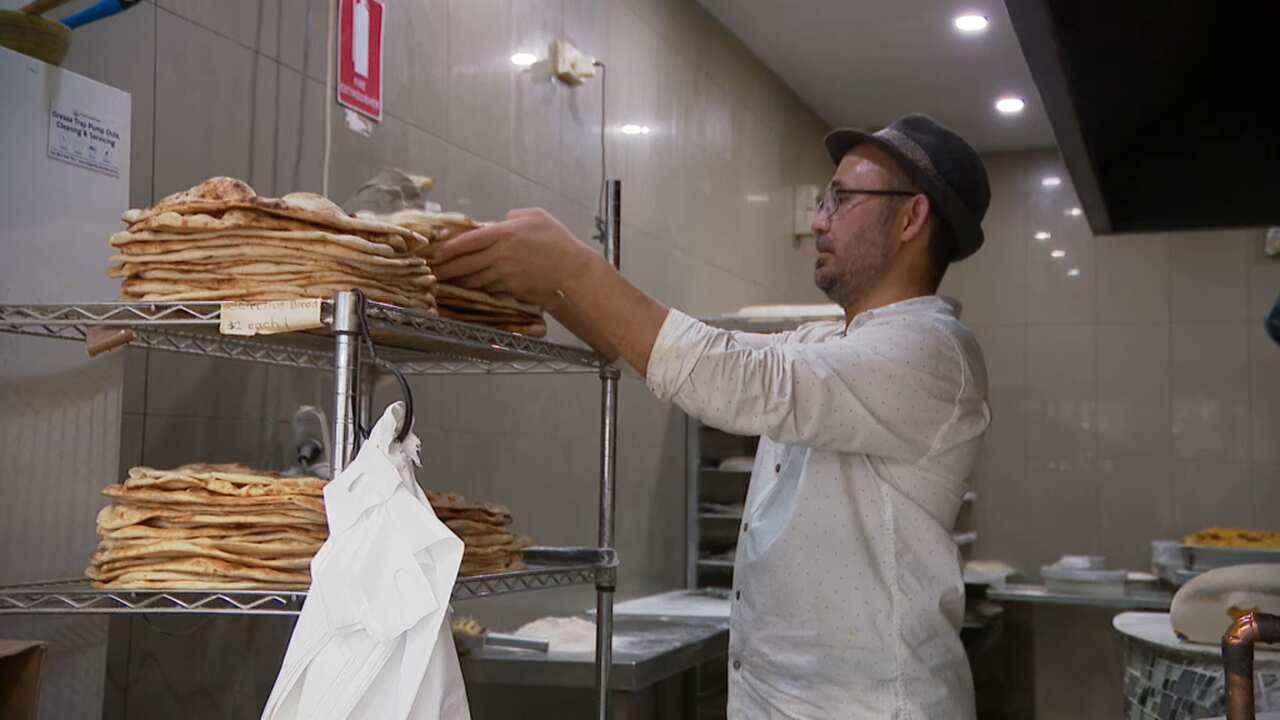 Salim Deeni making traditional Afghan bread at his restaurant Afghan Sufra