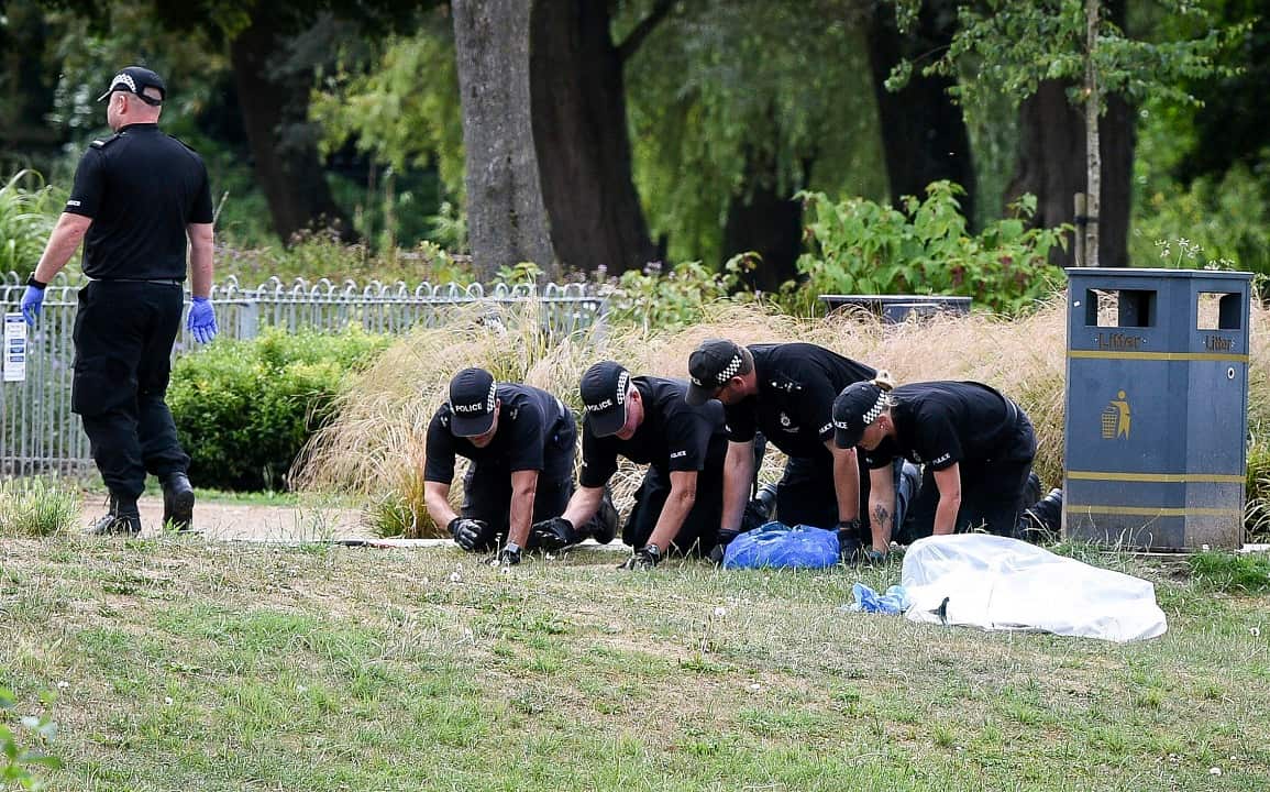 Police conduct fingertip searches of Queen Elizabeth Gardens, Salisbury.