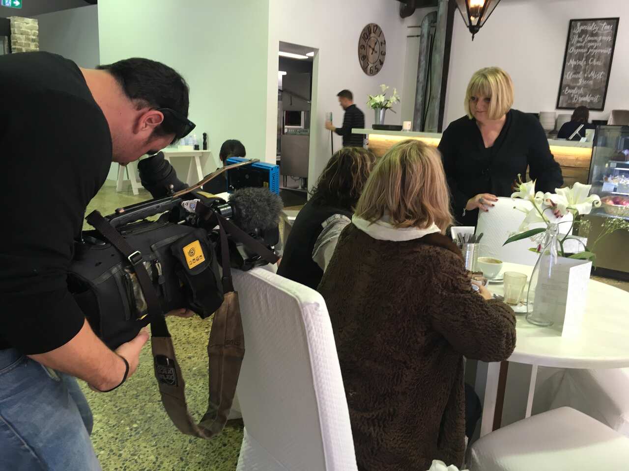 Freedom Hub Survivor School and Cafe owner Sally Irwin speaks with customers to help raise awarenss about slavery in Australia.  