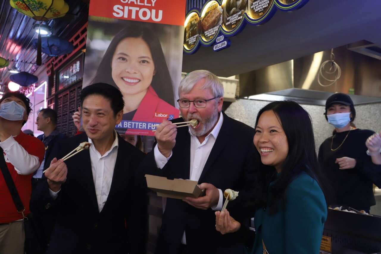 Labor Senate candidate Jason Yat-sen Li, Former Prime Minister Kevin Rudd and Federal Labor Candidate for Reid, Sally Sitou sample dumplings in Reid.