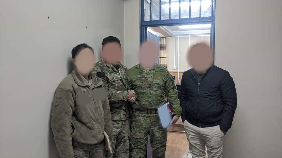 Samiullah Omari (far right) with Australian and US soldiers in Afghanistan.