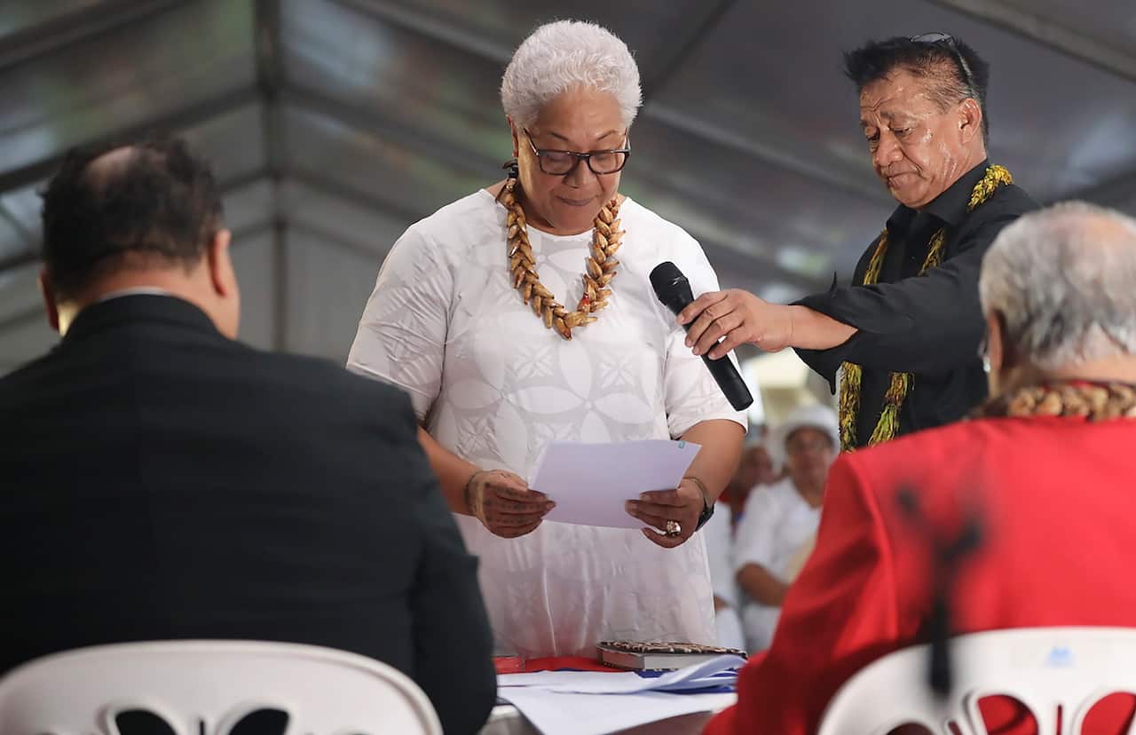 Samoas Prime Minister-elect Fiame Naomi Mataafa takes her oath at an unofficial ceremony outside parliament house in Apia, Samoa.