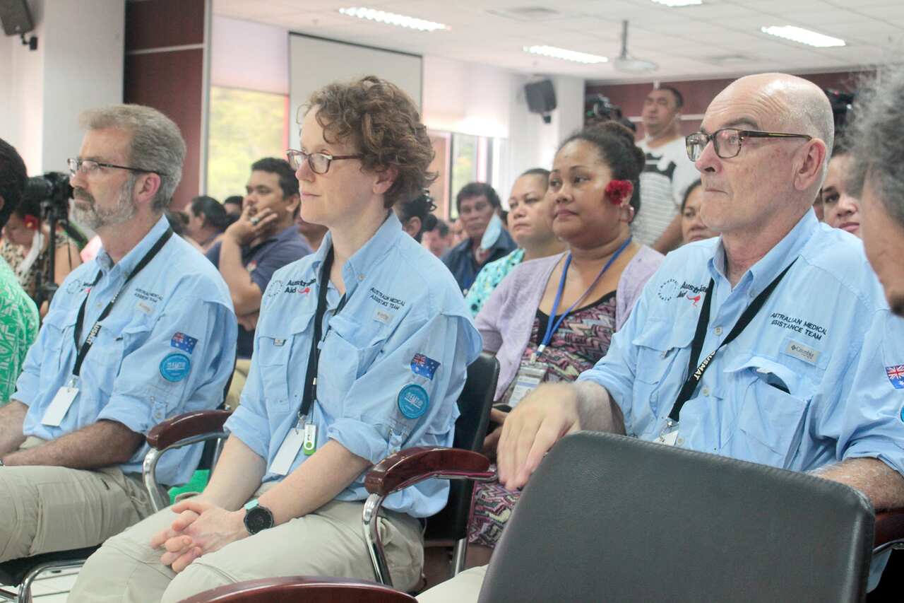 Australian medical staff at a briefing in Samoa about the mass vaccination program. 
