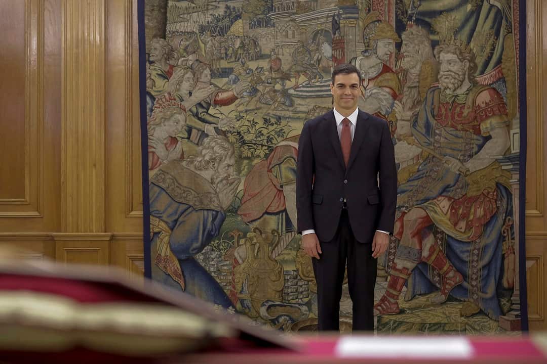 Spain's socialist leader Pedro Sanchez prepares to take the oath during the swearing in ceremony at the Zarzuela Palace.