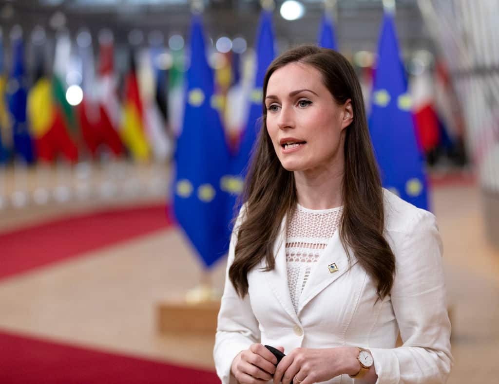 inish Prime Minister Sanna Mirella Marin talks to media as she arrives for an extraordinary EU Summit on 24 May, 2021 in Brussels, Belgium. 