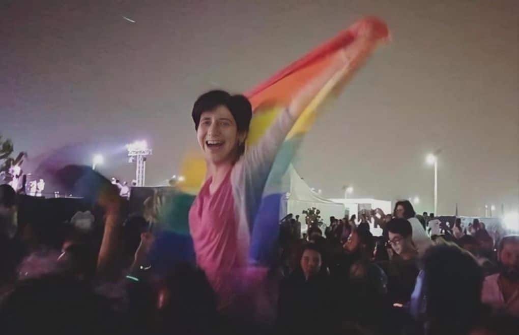 Sarah Hegazy flying the Pride flag at the Mashrou’ Leila concert in Cairo.