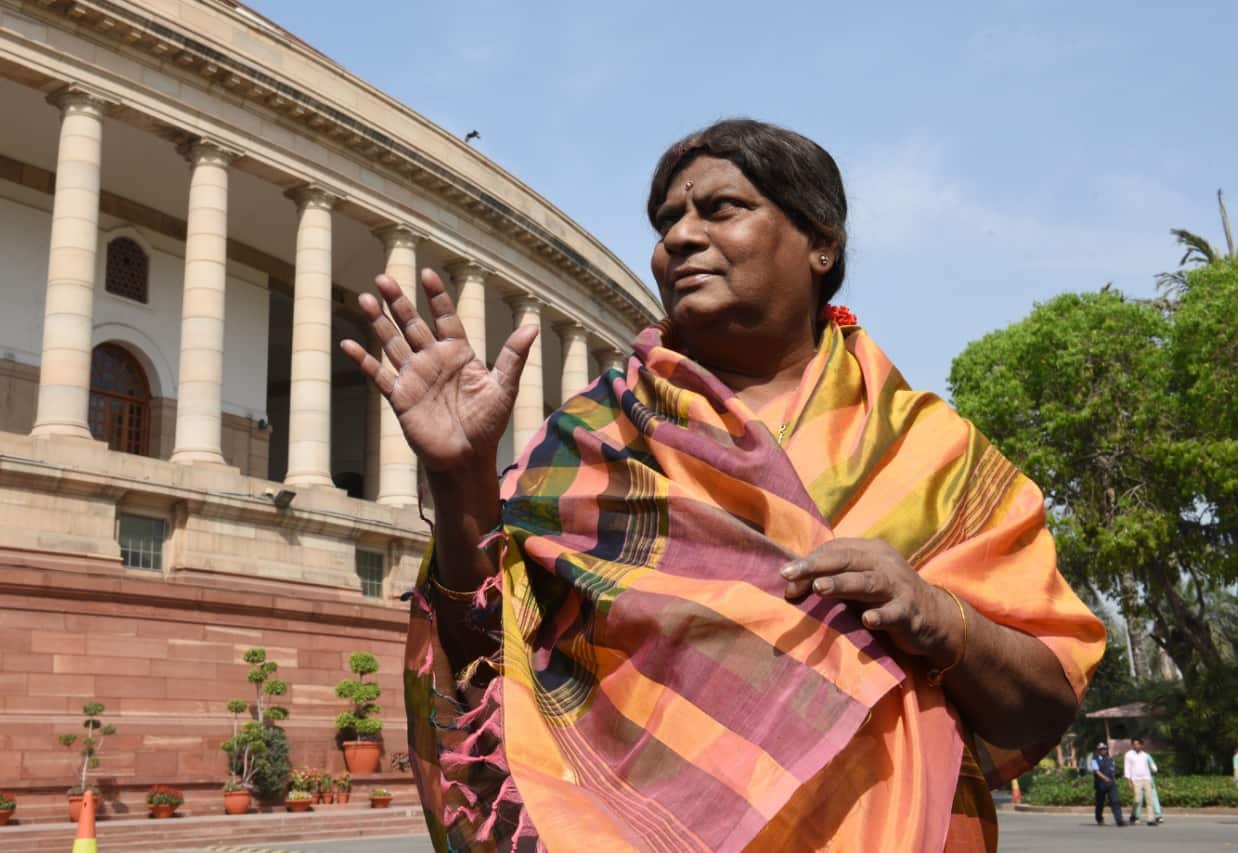 Sivaprasad wears sari during a protest demanding a special status for the state of Andhra Pradesh