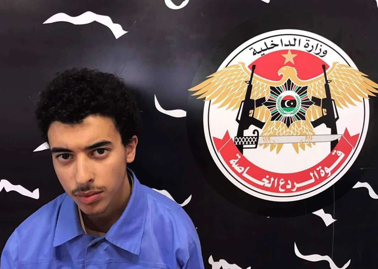 In this Wednesday, May 24, 2017 photo, Hashim Ramadan Abedi appears inside the Tripoli-based Special Deterrent anti-terrorism force unit after his arrest