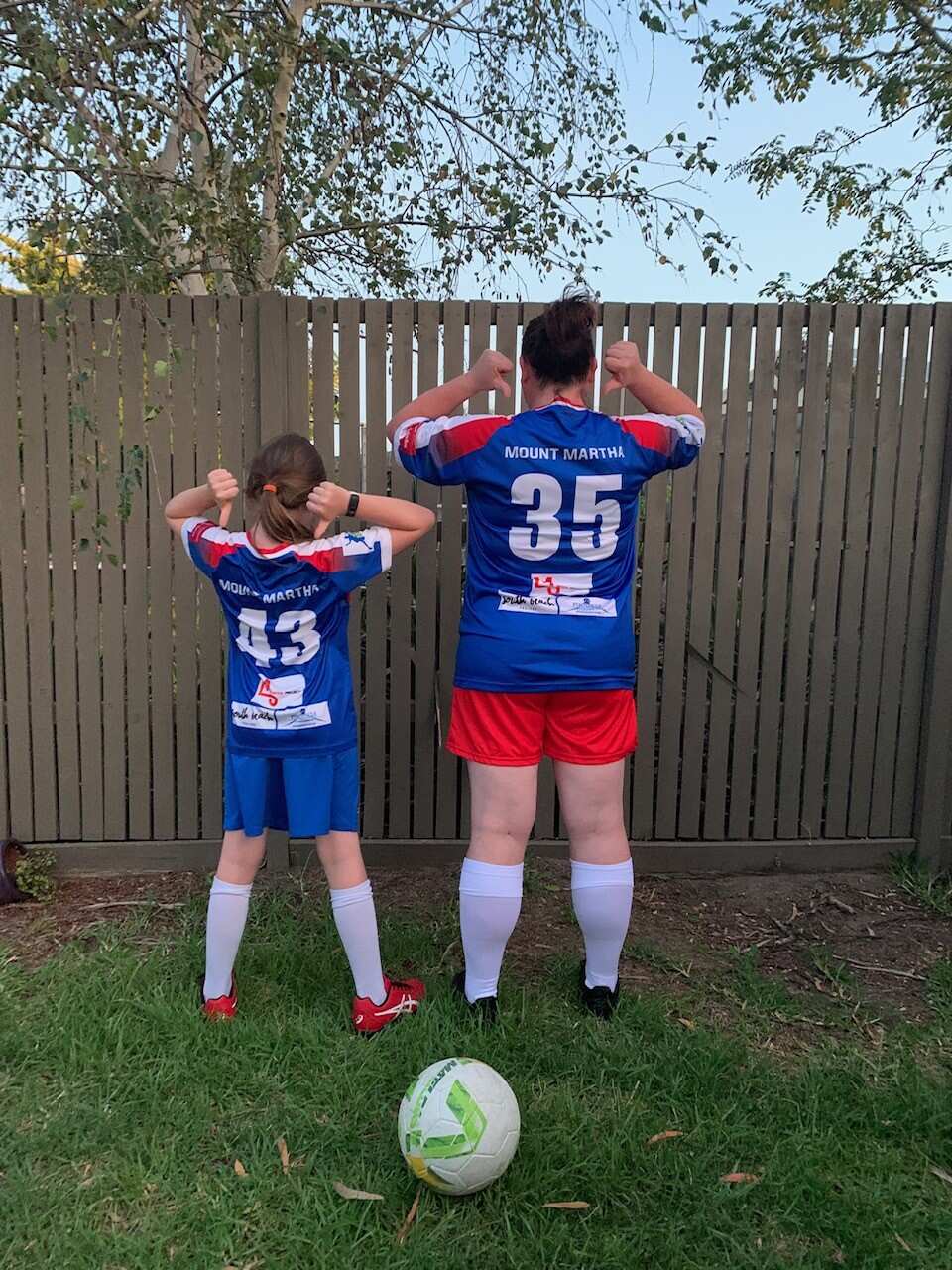 Shelley Christie and her daughter in their Mount Martha Soccer Club jerseys