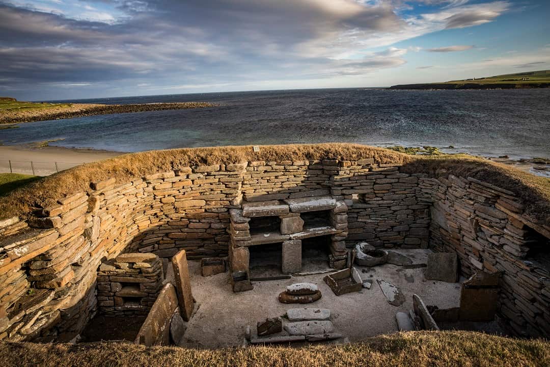 A house in Skara Brae, one of Europes best-preserved Stone Age villages, in the Orkney Islands in Scotland.