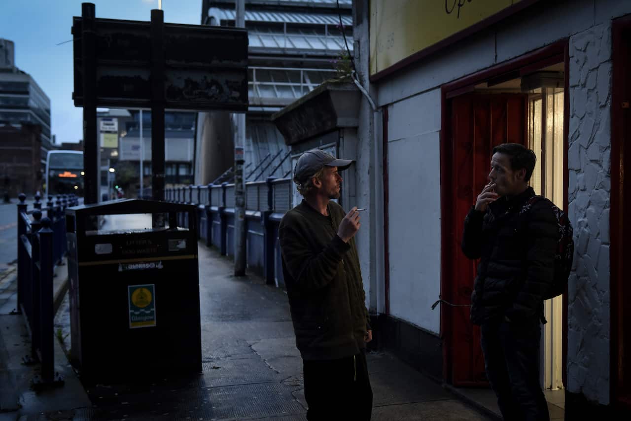 James Muir, left, and Tony Nugent in Glasgow, Scotland, July 23, 2019. (Mary Turner/The New York Times)