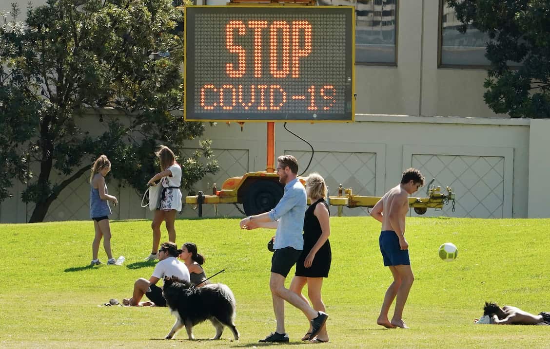 People at St Kilda Beach in Melbourne on Saturday.