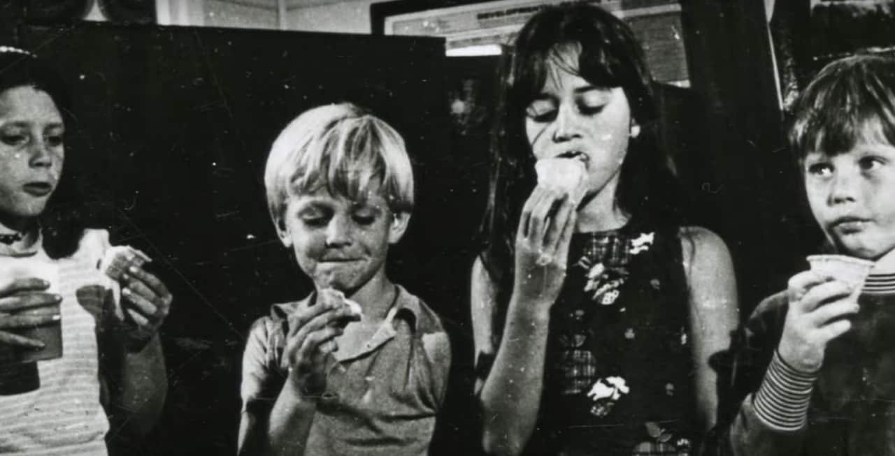Some of the children enjoying some snacks after being rescued.