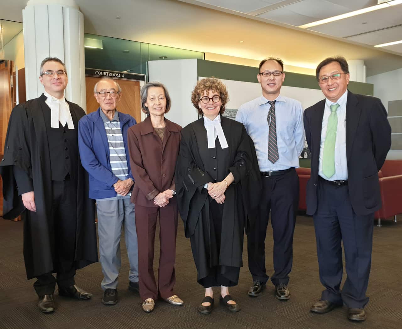 Troy Lee (2nd from right) at the federal court with (r to l) lawyer Matt Black, father Gordon Lee, mother Amy Lee, barrister Kim Rubenstein, and lawyer Michael Source: Michael Chan