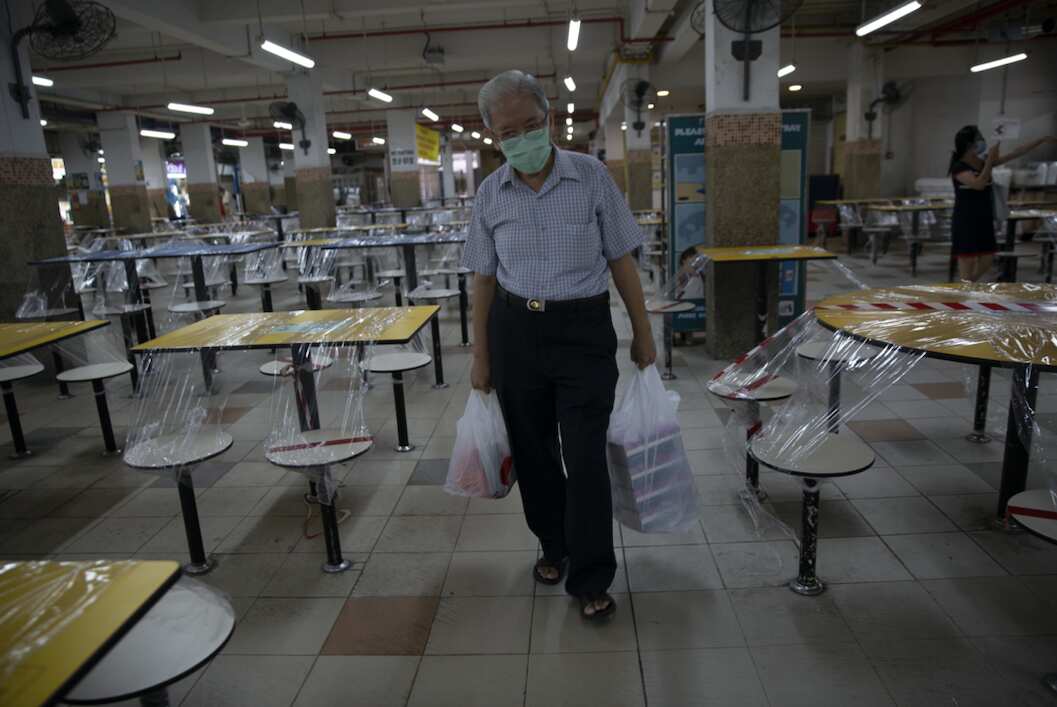 An empty hawker centre is Singapore.