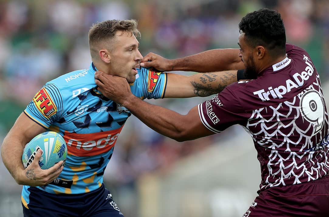 Bryce Cartwright of the Titans (left).