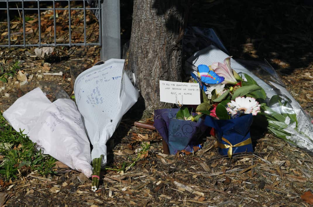 Flowers left outside the entrance to Anglicare's Newmarch House.