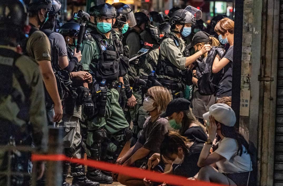 Riot police detain a group of people during an demonstration in Mongkok district last week.