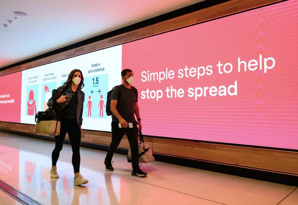 Signs warning of COVID-19 in Sydney.