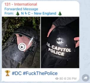 This image shows Nationalist Social Club stickers on what appears to be US Capitol Police equipment.