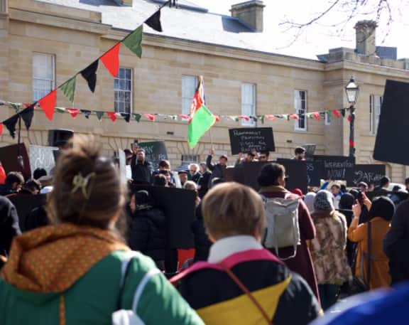 Demonstrators outside the parliament in Hobart