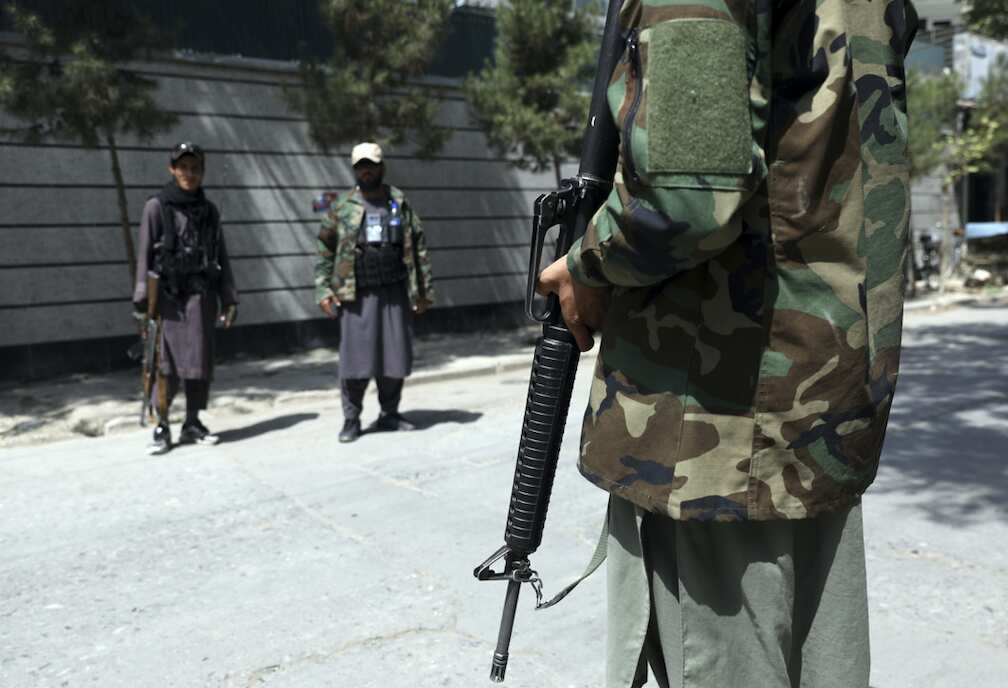 Taliban fighters stand guard at a checkpoint in the Wazir Akbar Khan neighbourhood in Kabul, Afghanistan, Sunday, Aug. 22, 2021