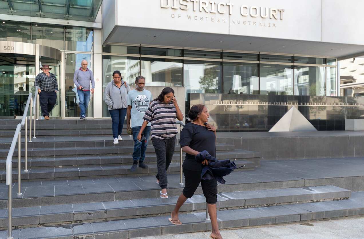 Supporters of the woman referred to as 'JC' outside the court in Perth