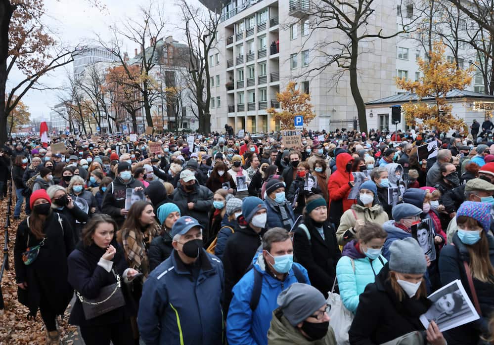 People take part in a protest under the slogan 'Not one more' in Warsaw, Poland, 6 November 2021.