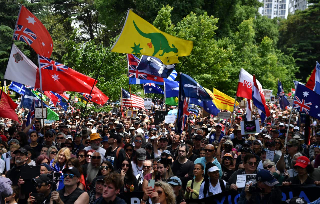 People participate in the 'freedom rally' protest in Melbourne, Saturday, December 4, 2021.