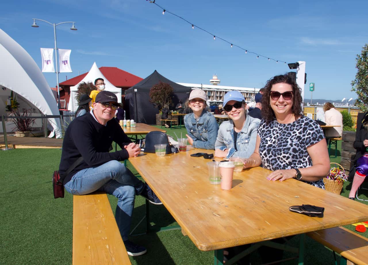 Kim Kelly (right) is visiting Hobart from Cairns with her family.