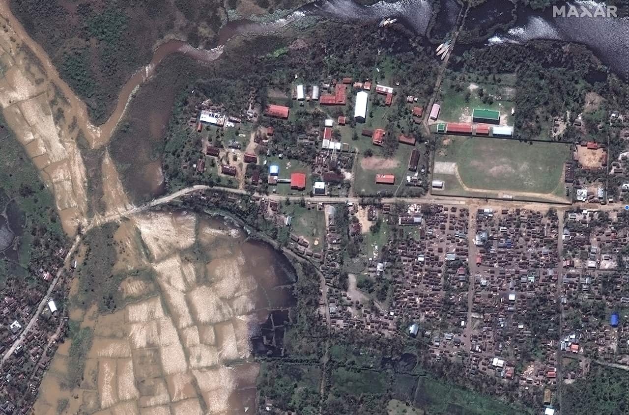 A handout satellite image shows widespread flooding and significant building damage following cyclone Batsirai, in Nosy Varika, Madagascar, 07 February. 
