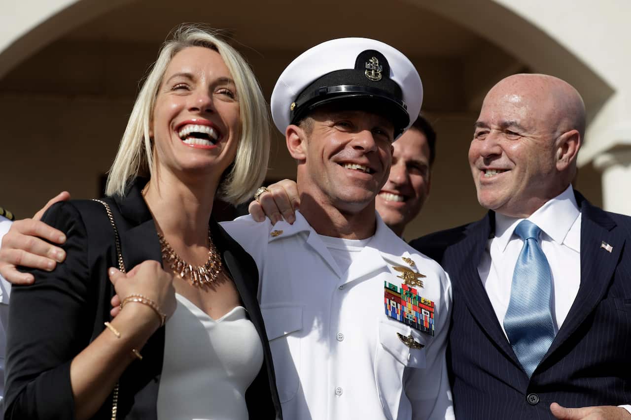 Navy Special Operations Chief Gallagher with his wife, Andrea, as they leave a military court.