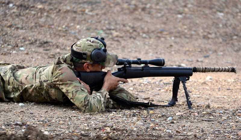 An Iraqi sniper takes aim during recent drills as part of the Iraqi Army's most recent offensive against the so-called Islamic State.