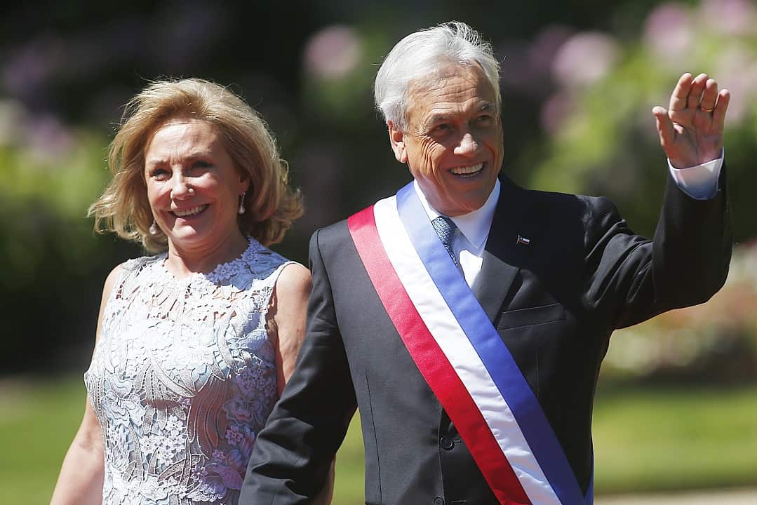 Chilean President Sebastian Pinera (right) and First Lady Cecilia Morel wave as they arrive for an official lunch at the Cerro Castillo Palace in Vina del Mar.