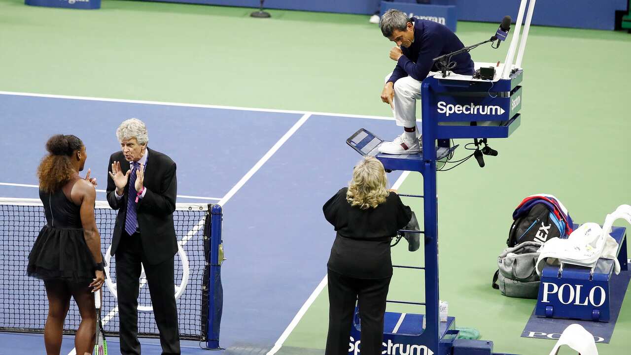 Serena Williams gestures towards tournament referee Brian Earley.