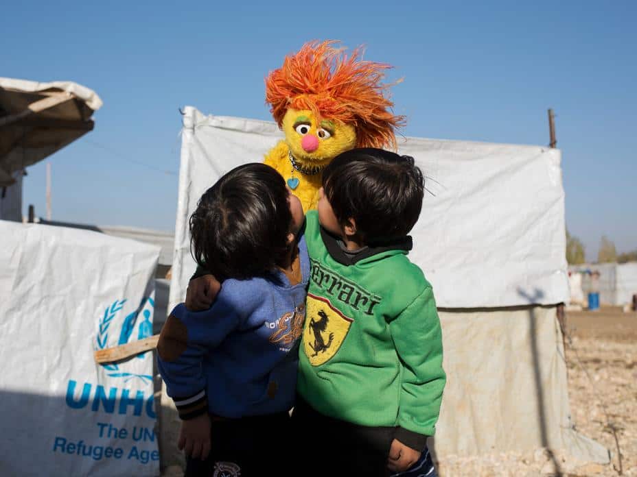 Syrian Cousins meet Tonton, a character from Jordan's Hikayat Simsim show.
