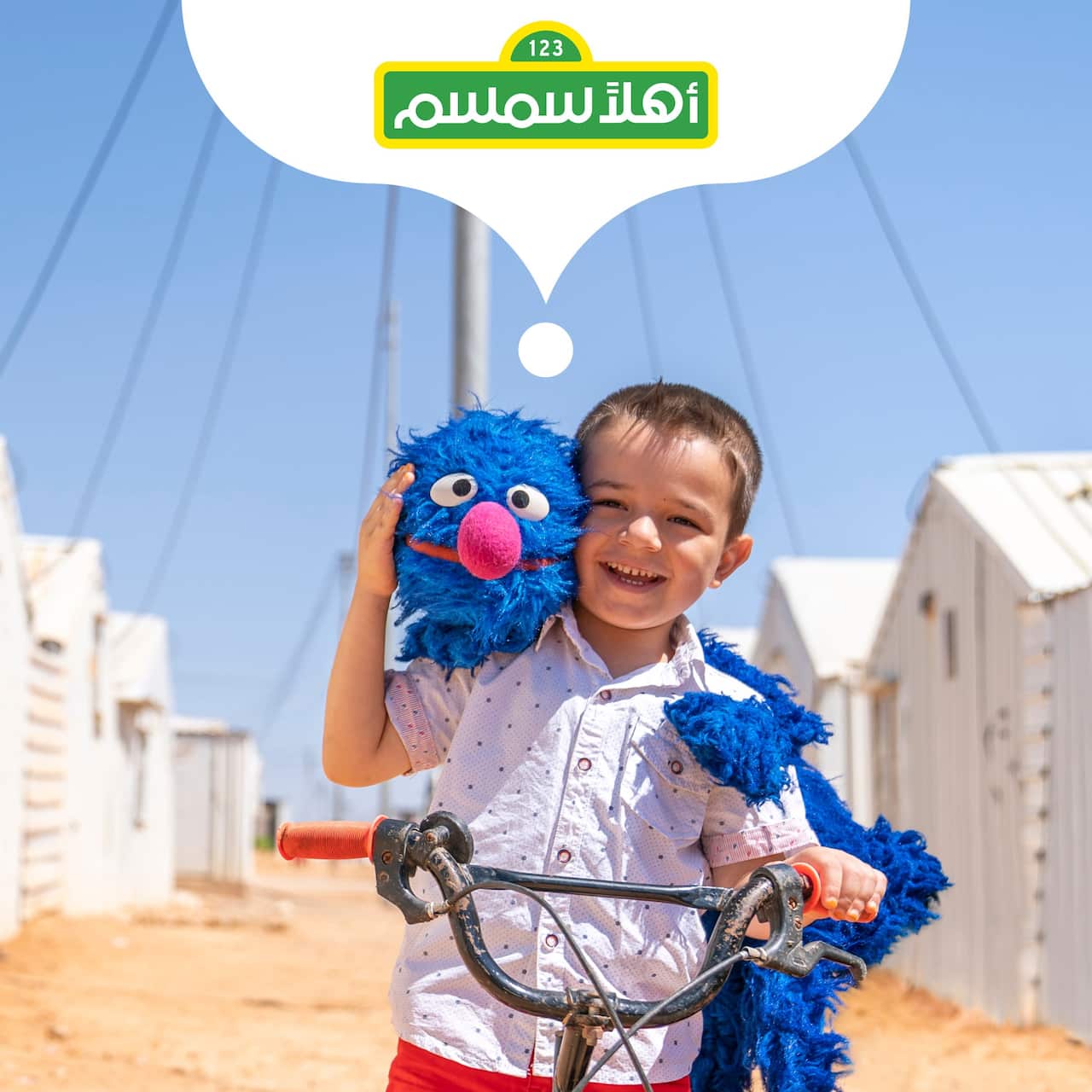 Syrian boy with Muppet