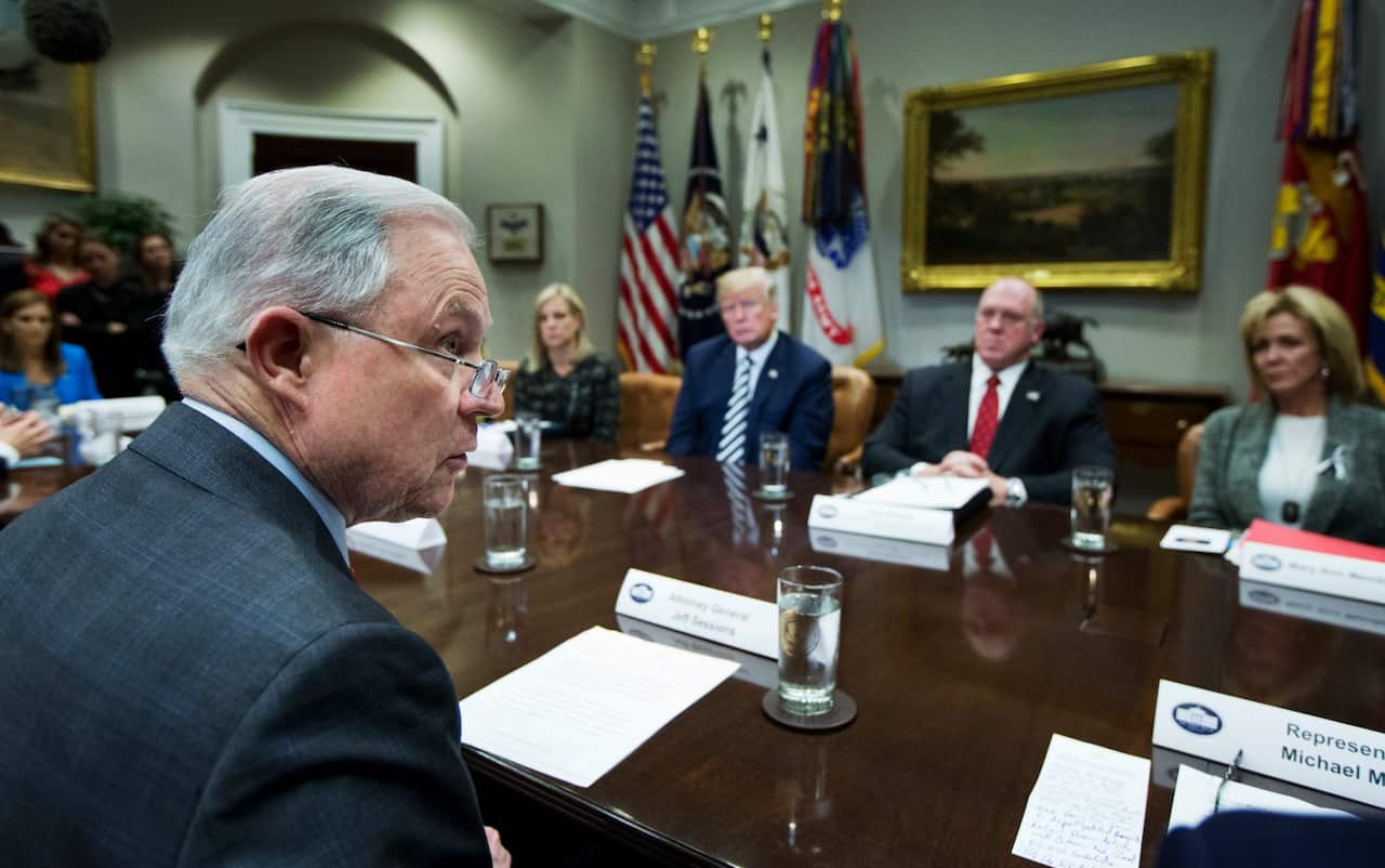 File image of Attorney General Jeff Sessions and US President Donald Trump