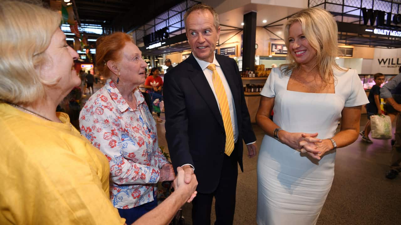 Federal Opposition Leader Bill Shorten and his wife Chloe greet shoppers during a visit to a shopping centre in North Lakes, Brisbane on 18/1/19.