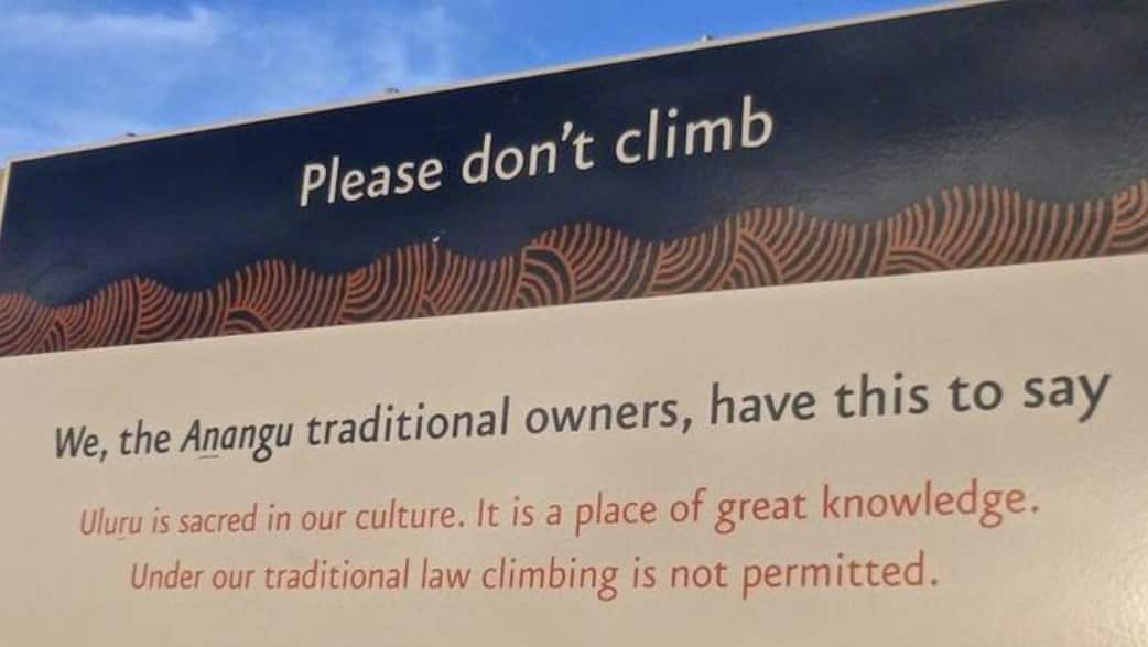 A sign located at Uluru. 