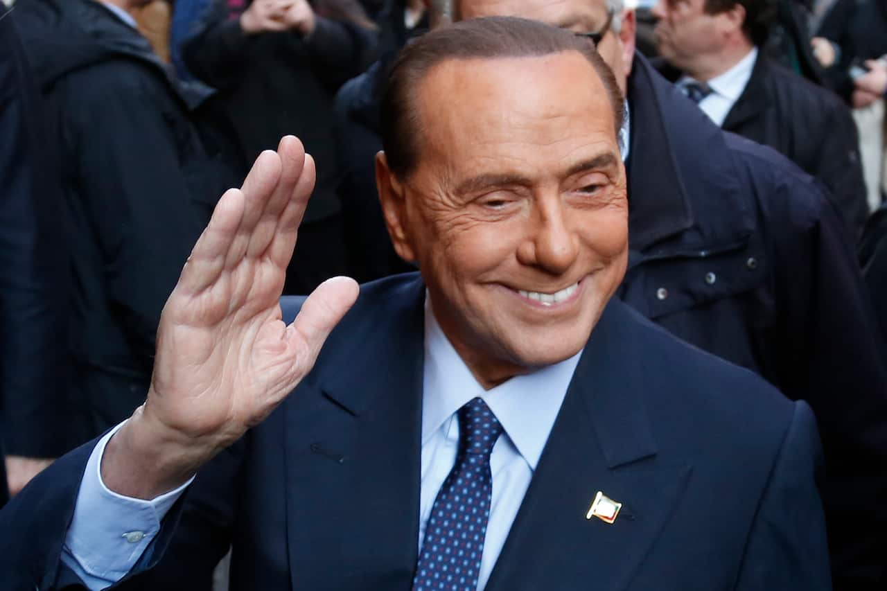 Silvio Berlusconi attending a conference in Rome