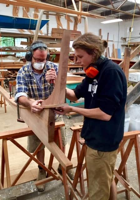 Simon Sadubin (left) is teaching Jo Street the specialised skill of timber boat building.