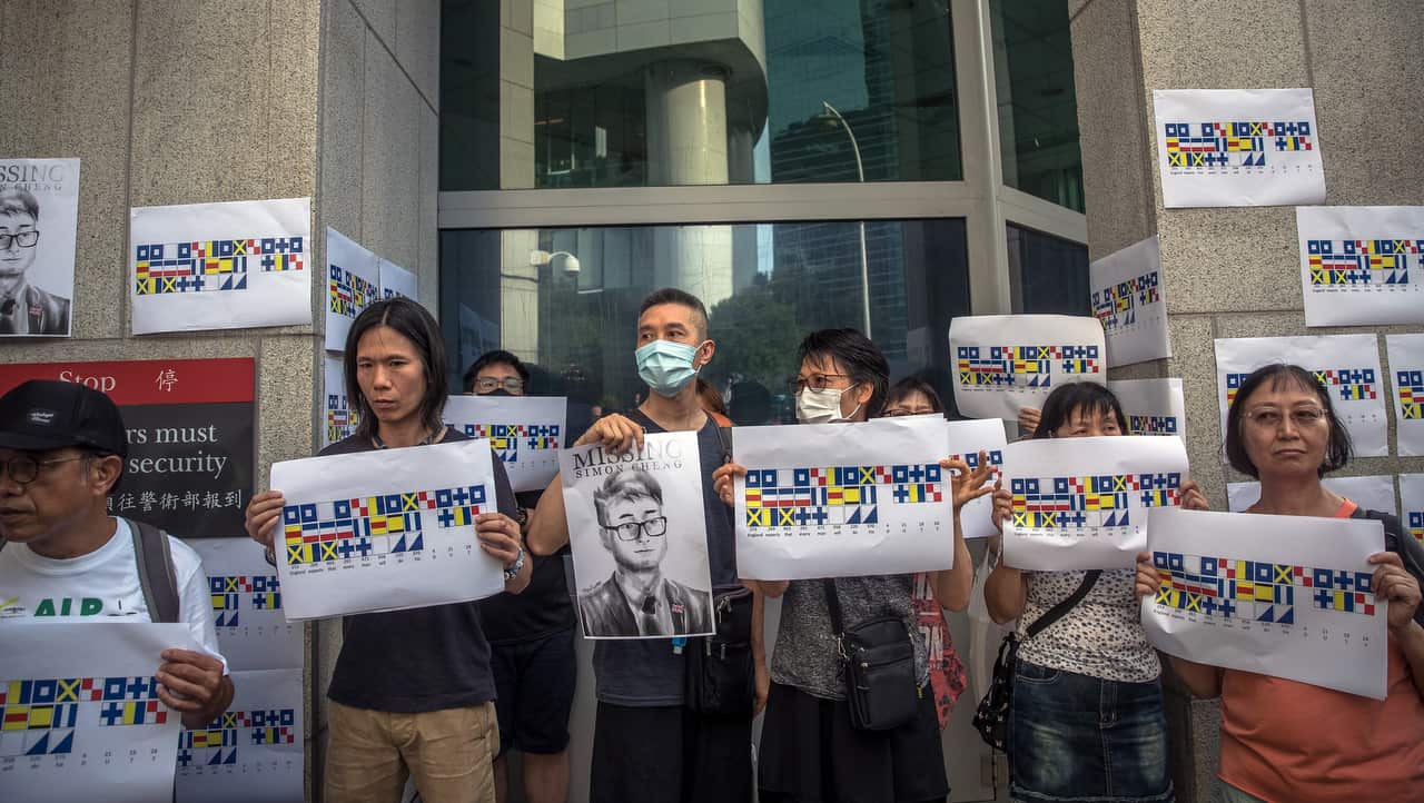Activists attend a rally in support of Simon Cheng in Hong Kong, China, 21 August 2019. 