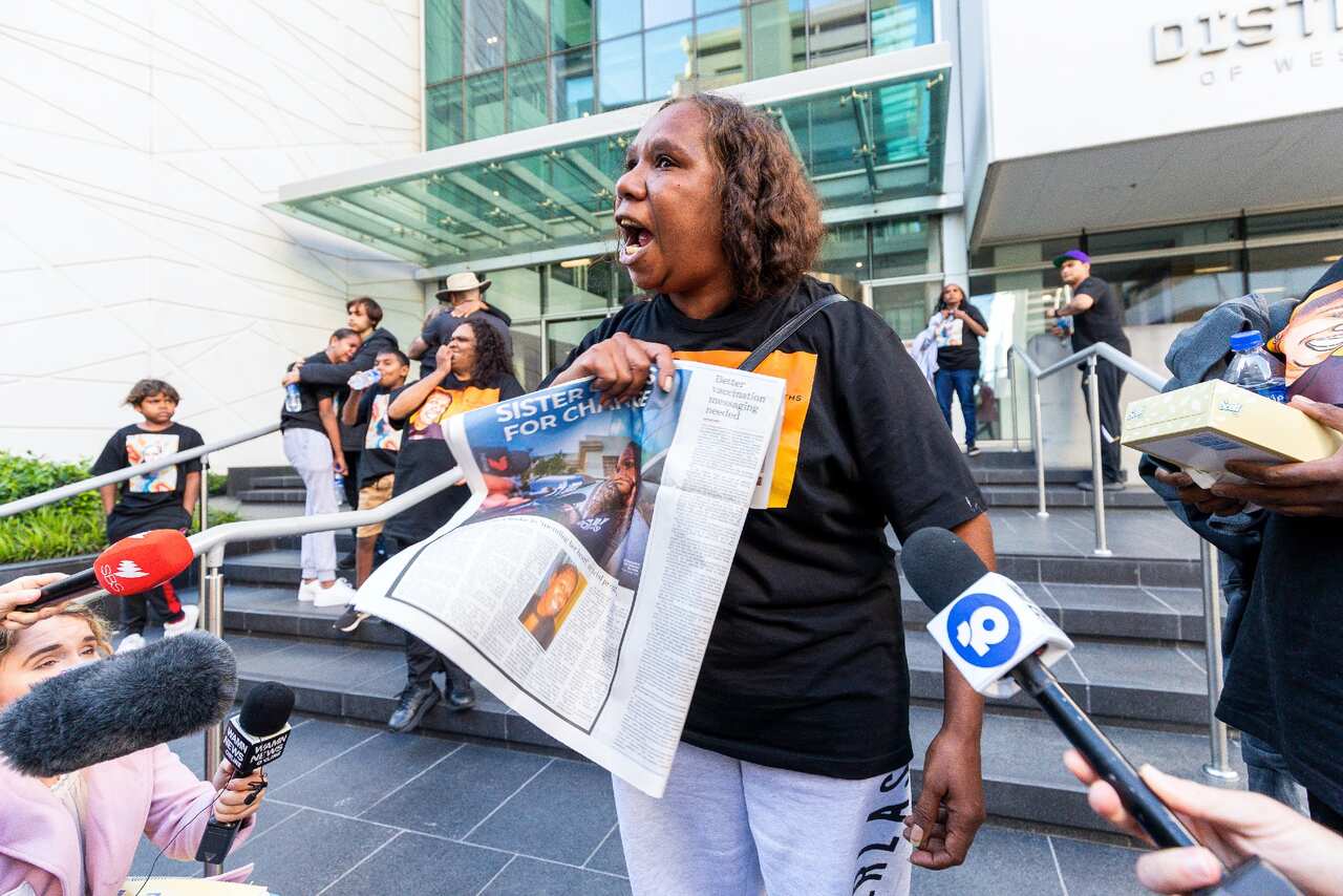 Bernadette Clarke, the sister of JC, speaks outside the Supreme Court in Perth on Friday.