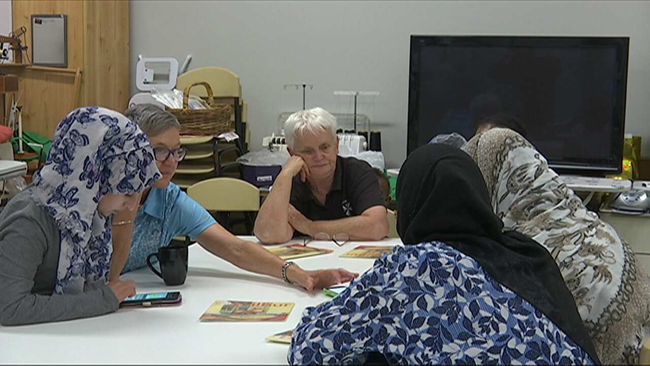 Sister Diana with the refugees at Zara's House