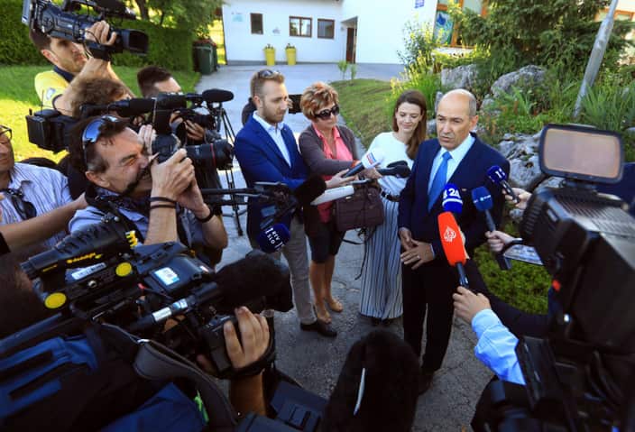 Janez Jansa, right-wing opposition Slovenian Democratic Party (SDS) leader speaks to reporters.