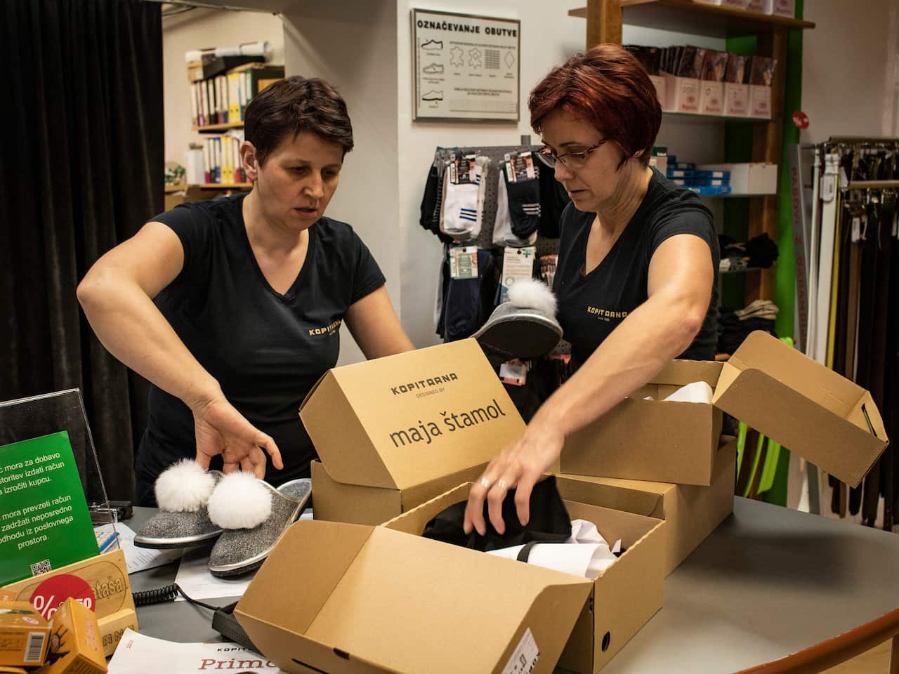 Employees sort out pairs of White House slippers at the Kopitarna factory in Sevnica, Slovenia.