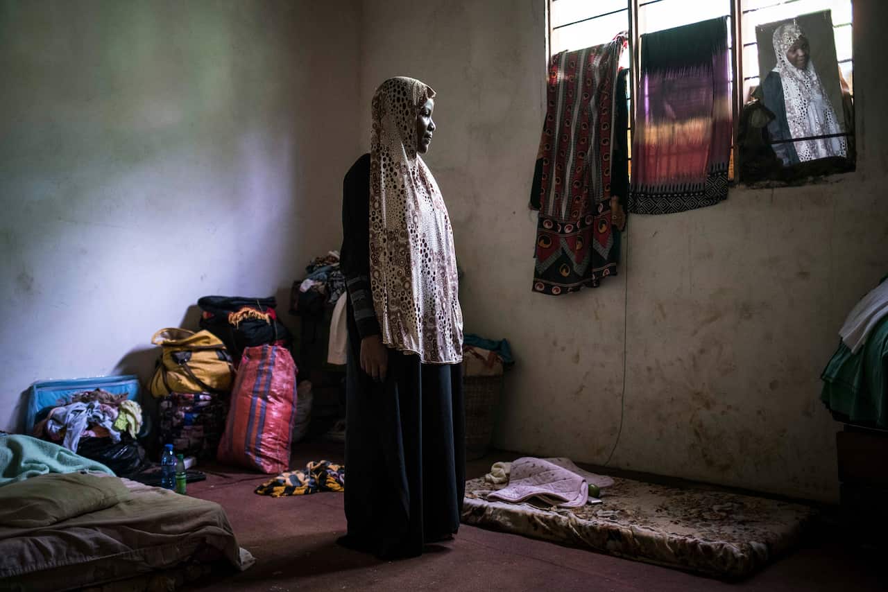 Riziki Abdallah, a star of the Zanzibari womens national team, in the bedroom she shares with her family in her village of Dole.