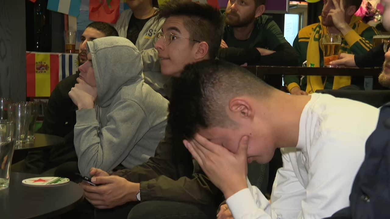 Disappointed fans watch the Socceroos.